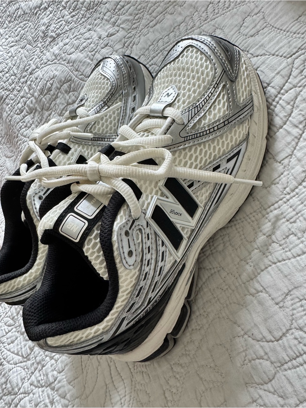 New Balance Women's White and Black Mesh Athletic Sneakers